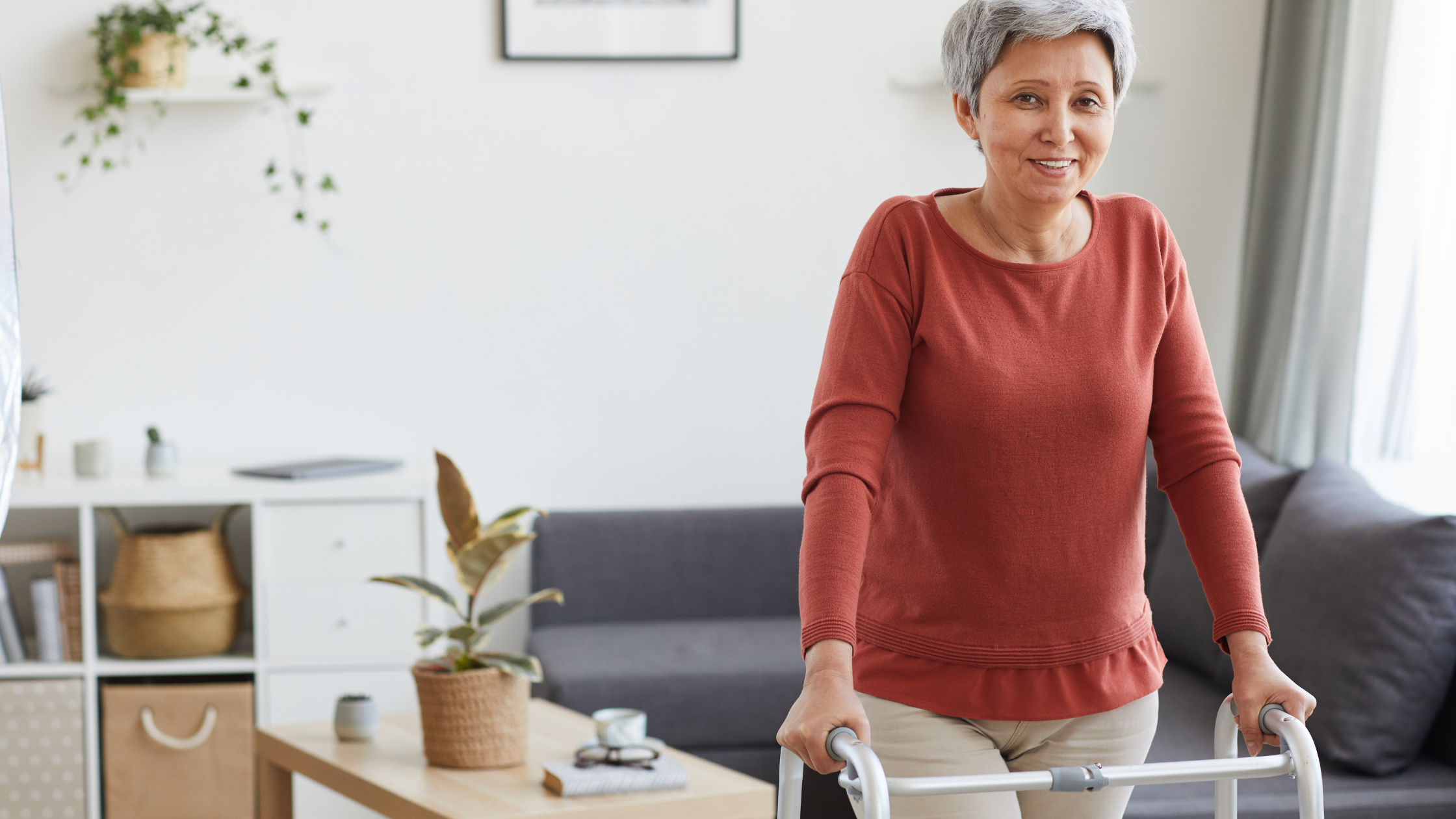Mature female using walker for assistance